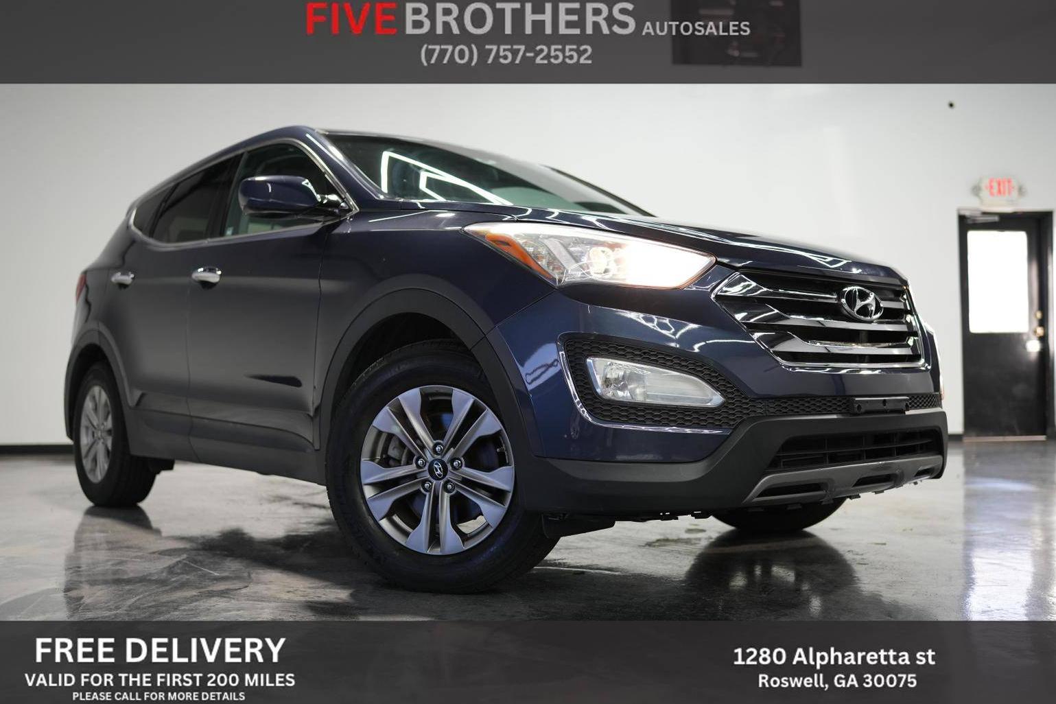 HYUNDAI SANTA FE 2016 5XYZTDLB1GG340376 image